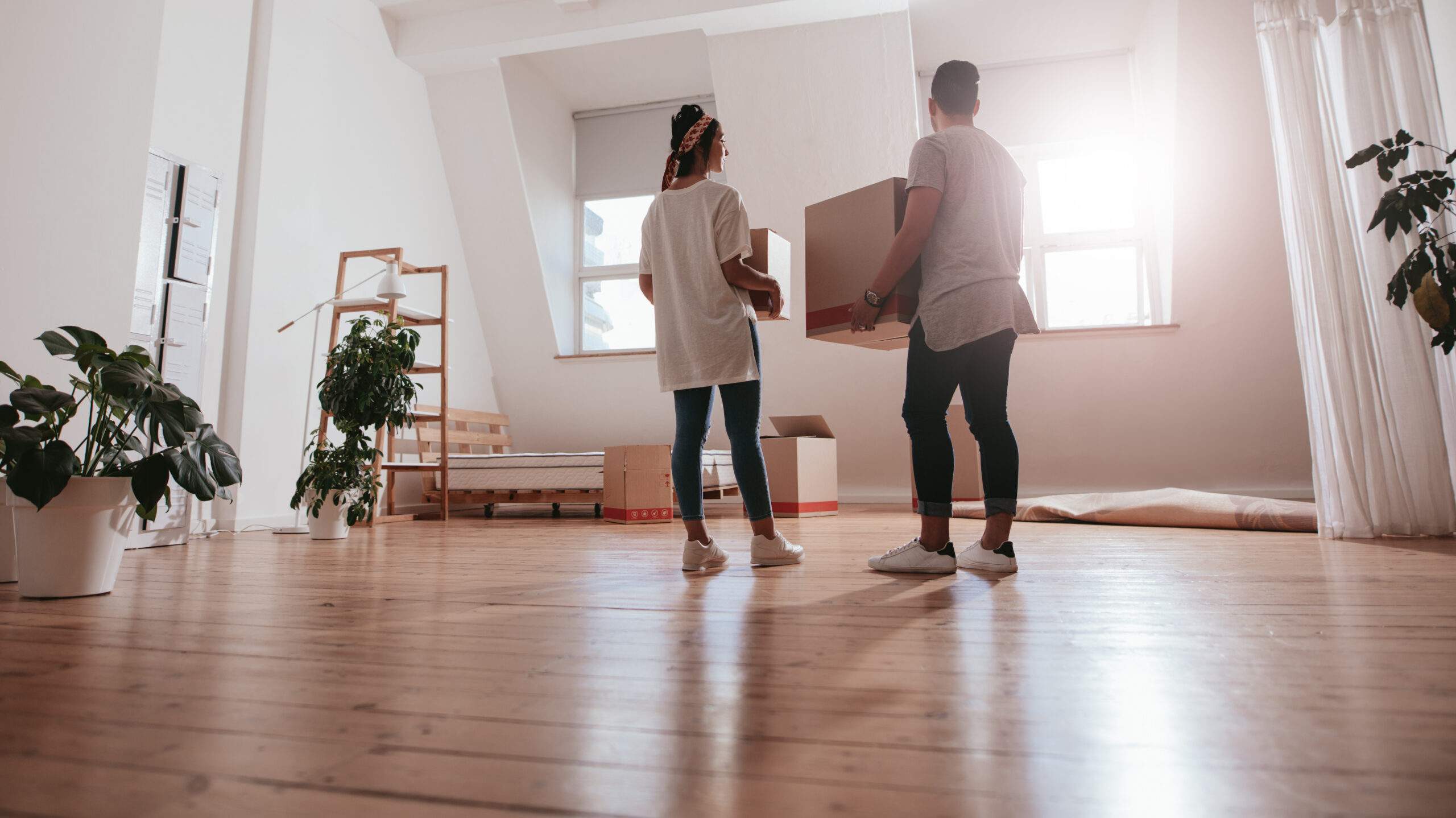 Solicitors & Surveys Young couple moving in new house